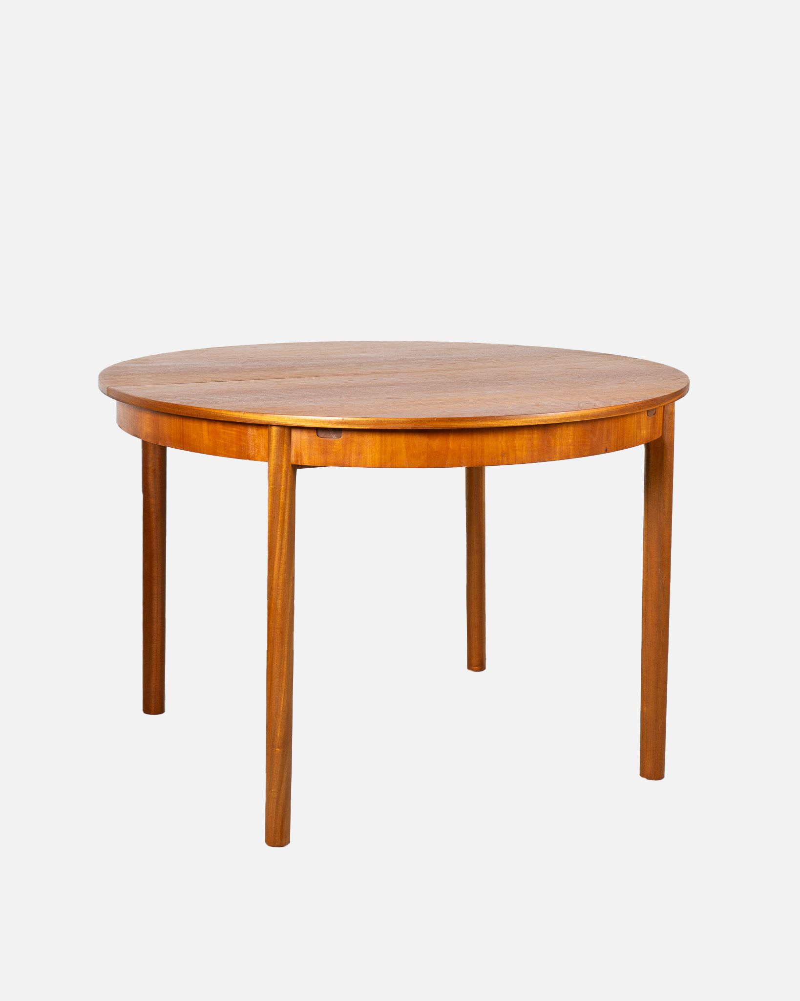 Mid Century Round dining table from Mcintosh, Eden Collection